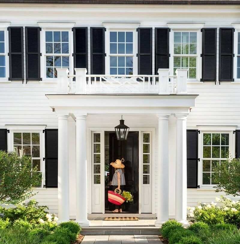 Beige siding & Black shutters