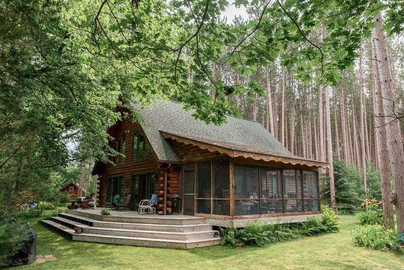 
Cozy Rustic Log-Cabin Style Overhang Idea