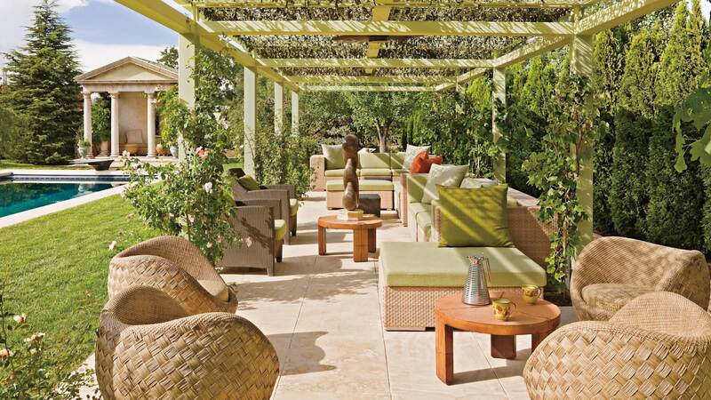 Outdoor Living Space with a Garden Cottage and Pergola