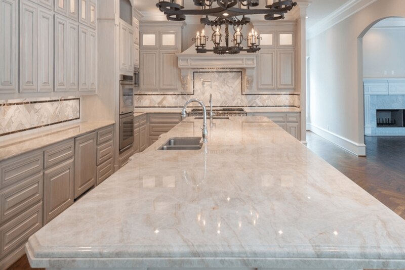 Taupe kitchen cabinets quartzite countertops