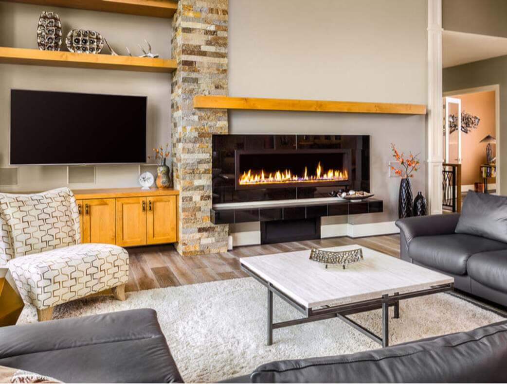 Wall-Mounted TV with Wall-Mounted Fireplace